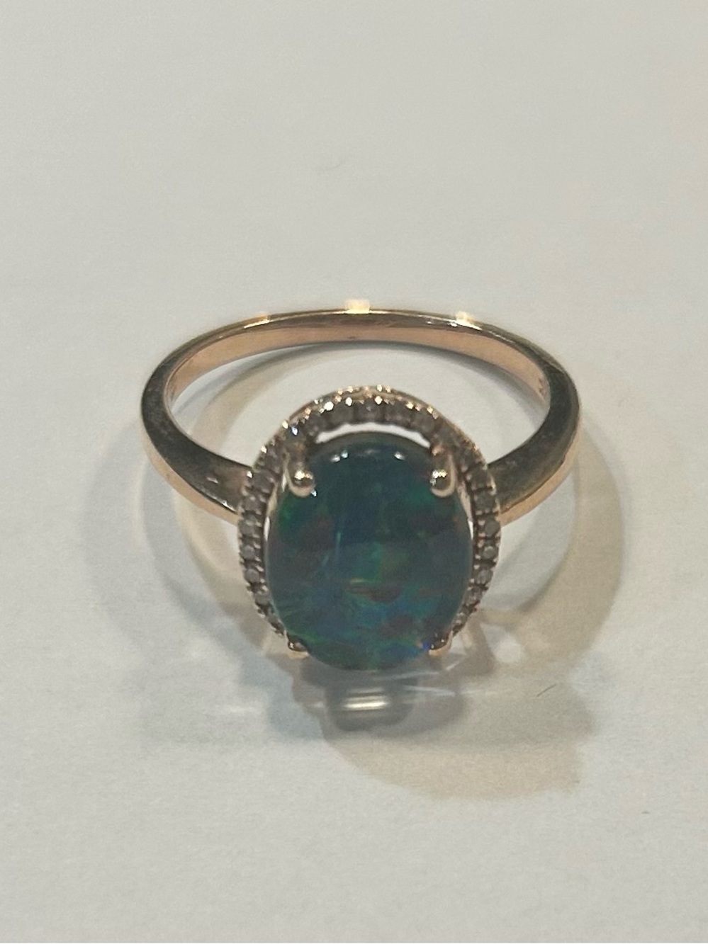 14k Gold Ring with Blue-Green Opal Halo and diamonds